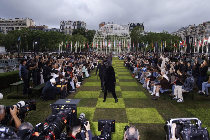 Models wear creations as part of the Louis Vuitton Spring Summer 2025 collection, that was presented in Paris, Tuesday, June 18, 2024. (Photo by Vianney Le Caer/Invision/AP)