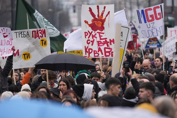 University students call for a general strike after more than two months of protests over the collapse of a concrete canopy that killed 15 people, in Belgrade, Serbia, Friday, Jan. 24, 2025. (AP Photo/Darko Vojinovic)