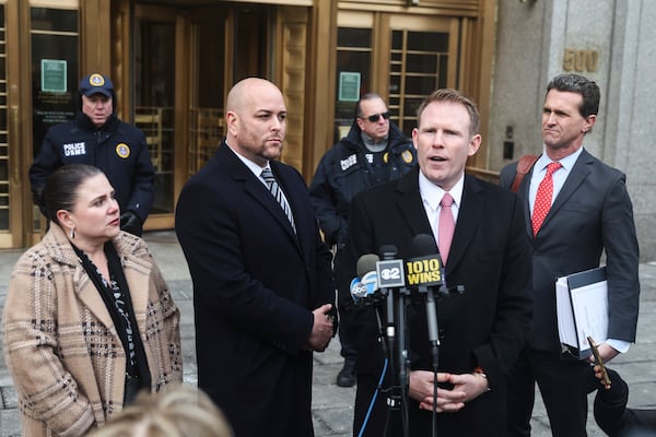 Andrew Giuliani, right, speaks next to attorney Joseph Cammarata outside of federal court, Thursday, Jan. 16, 2025, in New York. (AP Photo/Heather Khalifa)