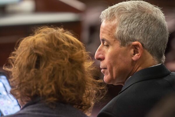 Defense attorney Brian Steel, right, sits in court with his client, former District Attorney Jackie Johnson, on Tuesday, Jan. 21, 2025, in Brunswick, Georgia, as jury selection begins in Johnson’s misconduct trial. Johnson is charged with interfering with police investigating the 2020 killing of Ahmaud Arbery. (Michael Hall/The Brunswick News via AP, Pool)