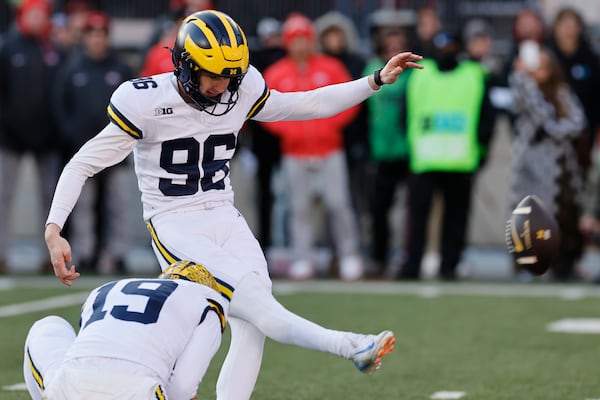 Michigan kicker Dominic Zvada kicks the game-winning field goal against Ohio State during the second half of an NCAA college football game Saturday, Nov. 30, 2024, in Columbus, Ohio. (AP Photo/Jay LaPrete)