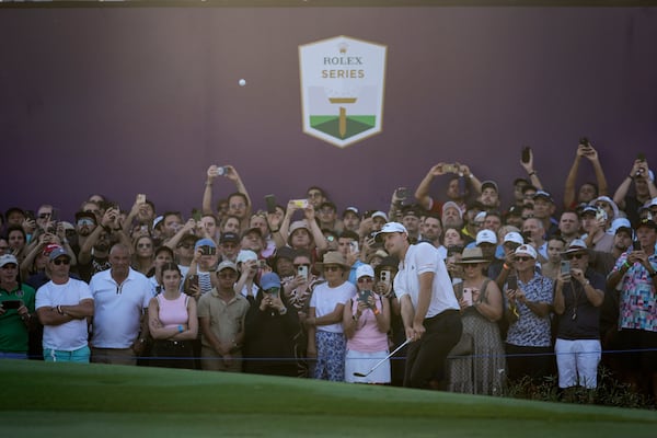 Rasmus Hojgaard of Denmark plays a shot on the 18th green in the final round of World Tour Golf Championship, in Dubai, United Arab Emirates, Sunday, Nov. 17, 2024. (AP Photo/Altaf Qadri)