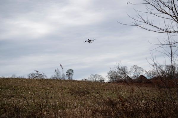 Russell Hedrick's DJI drone puts crop cover on his farm, Tuesday, Dec. 17, 2024, in Hickory, N.C. (AP Photo/Allison Joyce)