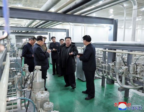 In this undated photo provided Wednesday, Jan. 29, 2025, by the North Korean government, its leader Kim Jong Un, second right, inspects a facility that produces nuclear material at an undisclosed location in North Korea. Independent journalists were not given access to cover the event depicted in this image distributed by the North Korean government. The content of this image is as provided and cannot be independently verified. Korean language watermark on image as provided by source reads: "KCNA" which is the abbreviation for Korean Central News Agency. (Korean Central News Agency/Korea News Service via AP)