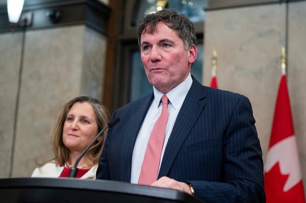 Minister of Public Safety, Democratic Institutions and Intergovernmental Affairs Dominic LeBlanc delivers remarks on Parliament Hill in Ottawa, Ontario, Wednesday, Dec. 11, 2024. (Spencer Colby/The Canadian Press via AP)