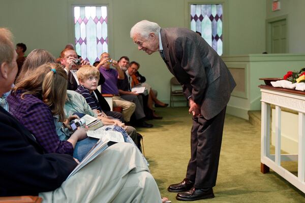 FILE - President Jimmy Carter teaches Sunday school at Maranatha Baptist Church in Plains, Ga., Sept. 22, 2009. (AP Photo/John Bazemore, File)