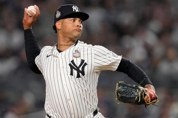 New York Yankees pitcher Luis Gil throws against the Los Angeles Dodgers during the first inning in Game 4 of the baseball World Series, Tuesday, Oct. 29, 2024, in New York. (AP Photo/Ashley Landis)