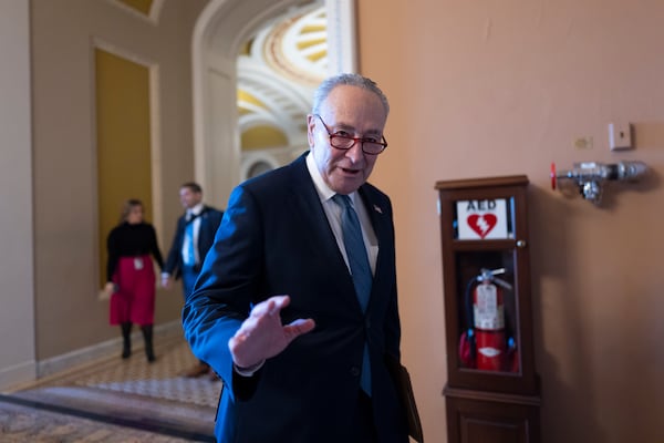 Senate Majority Leader Chuck Schumer, D-N.Y., arrives to join fellow Democrats for a caucus leadership election, at the Capitol in Washington, Tuesday, Dec. 3, 2024. (AP Photo/J. Scott Applewhite)