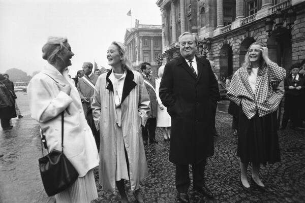 FILE - Leader of the French National Front, Jean Marie Le Pen, second from right, leads a march to the statue of Joan of Arc with his three daughters Marie Caroline, Yann and Marine Le Pen, on May 12, 1985. (AP Photo/Herve Merliac, File)