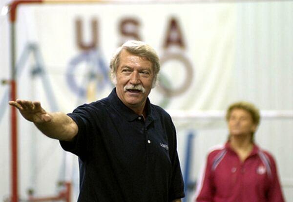 FILE - Bela Karolyi speaks during the opening of his training center for the U.S. gymnastics women's national team in Huntsville, Texas, May 19, 2003. (Travis Bartoshek/The Huntsville Item via AP, File)