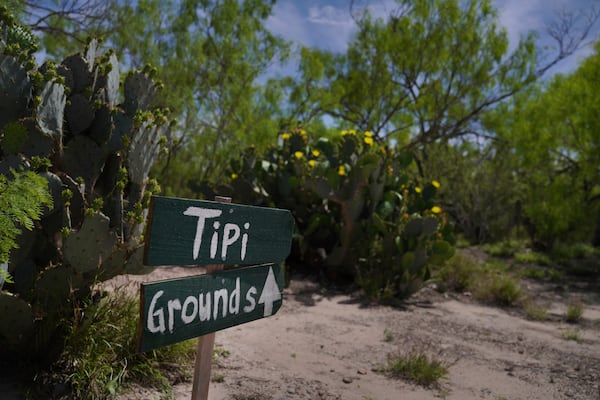 A sign leading to the tipi grounds at the Indigenous Peyote Conservation Initiative homesite in Hebbronville, Texas, Sunday, March 24, 2024. (AP Photo/Jessie Wardarski)