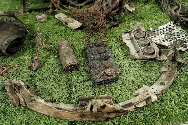 Fragments of a rocket which struck Dnipro on November 21 are seen at a center for forensic analysis in undisclosed location, Ukraine, Sunday Nov. 24, 2024. (AP Photo/Evgeniy Maloletka)