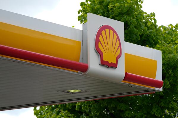 FILE - The Shell oil company logo is displayed at a fuel station in London, on May 5, 2022. (AP Photo/Alastair Grant, File)