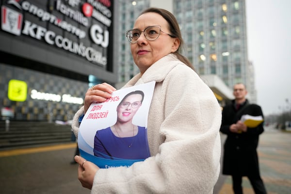 Belarusian presidential candidate Hanna Kanapatskaya stands at an agitation picket ahead of presidential elections in Minsk, Belarus, Friday, Jan. 24, 2025. (AP Photo/Pavel Bednyakov)