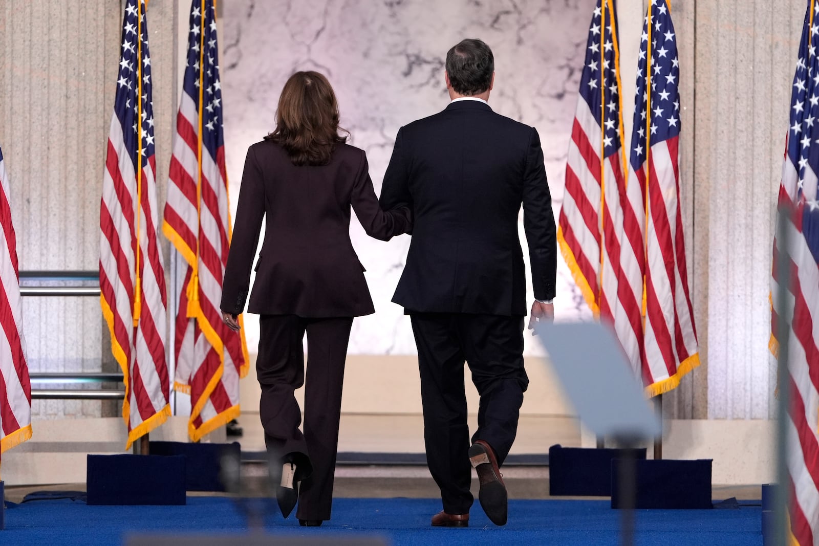 Second gentleman Doug Emhoff, right, walks with Vice President Kamala Harris as she departs after delivering a concession speech for the 2024 presidential election on the campus of Howard University in Washington, Wednesday, Nov. 6, 2024. (AP Photo/J. Scott Applewhite)