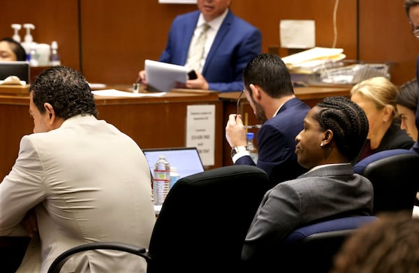 Rakim Mayers, aka A$AP Rocky, lower right, frowns while listening to opening remarks from the prosecuting attorney during his trial at the Clara Shortridge Foltz Criminal Justice Center in downtown Los Angeles, Friday, Jan. 24, 2025. (Genaro Molina/Los Angeles Times via AP, Pool)