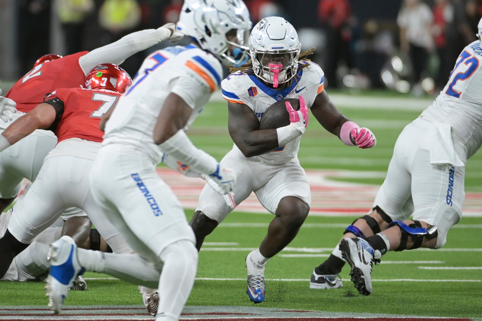 Boise State running back Ashton Jeanty (2) looks for a hole in the UNLV defense during the first half of an NCAA college football game Friday, Oct. 25, 2024, in Las Vegas. (AP Photo/Sam Morris)