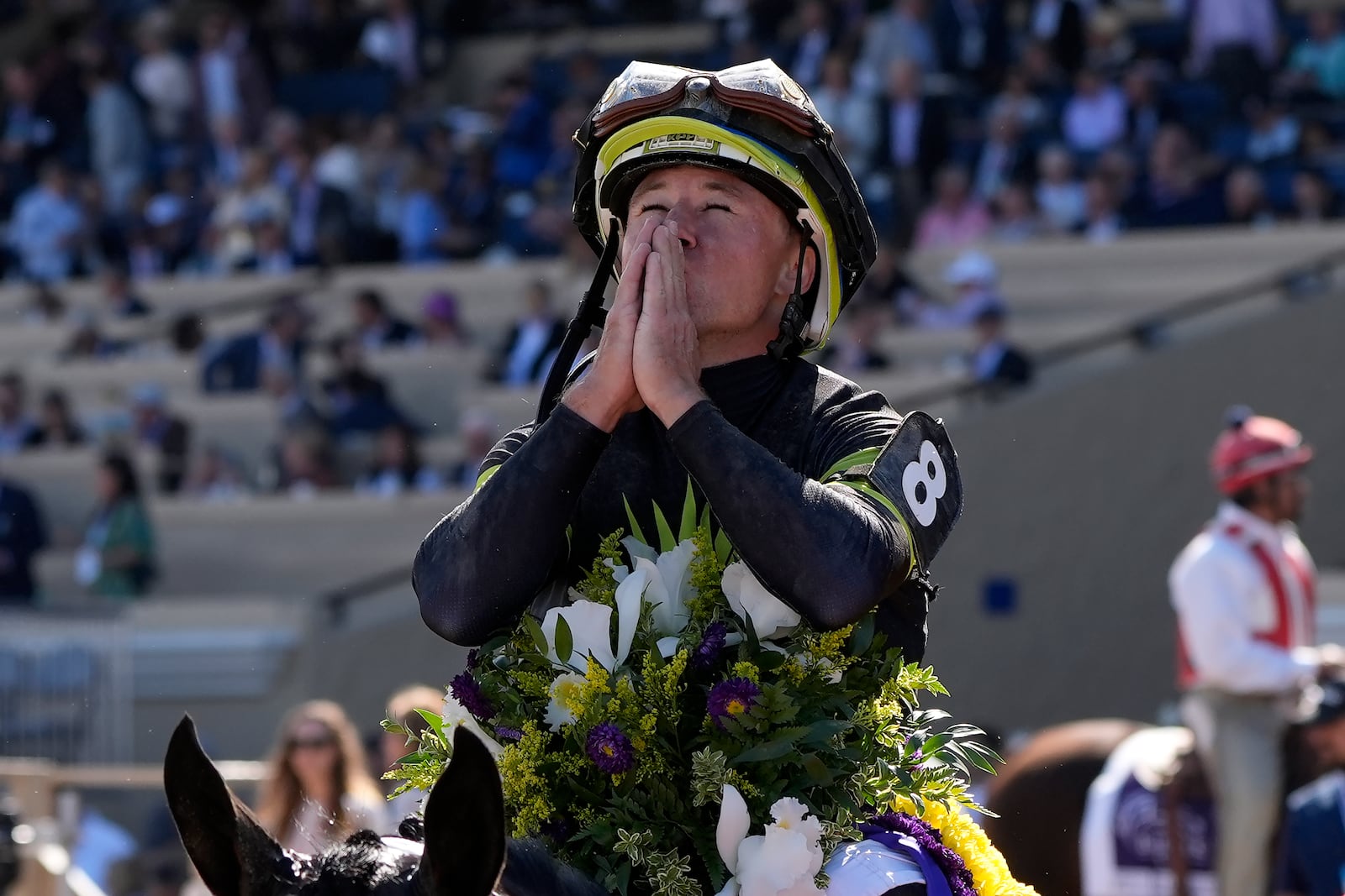 Drayden Van Dyke reacts after riding Soul Of An Angel to victory in the Breeders' Cup Filly and Mare Sprint horse race in Del Mar, Calif., Saturday, Nov. 2, 2024. (AP Photo/Gregory Bull)