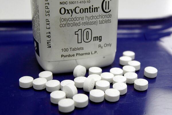 FILE - OxyContin pills arranged for a photo at a pharmacy, Feb. 19, 2013 in Montpelier, Vt. (AP Photo/Toby Talbot, File)