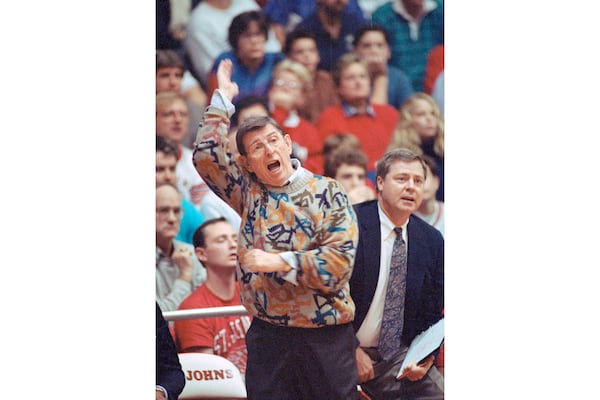 FILE - Lou Carnesecca coaches his St. John's team from the sidelines during their game against Niagara in New York, on Nov. 23, 1991. (AP Photo/Mark Lennihan, File)