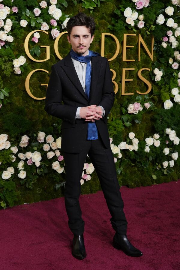 Timothee Chalamet arrives at the 82nd Golden Globes on Sunday, Jan. 5, 2025, at the Beverly Hilton in Beverly Hills, Calif. (Photo by Jordan Strauss/Invision/AP)