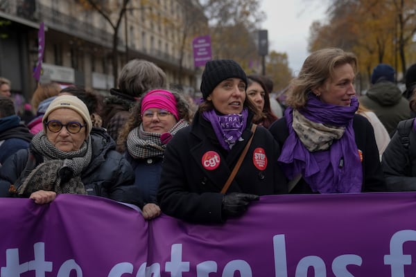 CGT union secretary general Sophie Binet, center, attends a march during the International Day for the Elimination of Violence Against Women in Paris, France, Saturday, Nov. 23, 2024. (AP Photo/Thibault Camus)