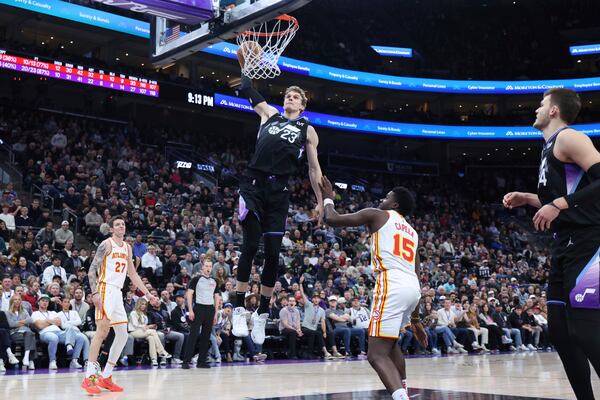 Utah Jazz forward Lauri Markkanen (23) dunks the ball against the Atlanta Hawks during the fourth quarter of an NBA basketball game, Tuesday, Jan. 7, 2025, in Salt Lake City. (AP Photo/Rob Gray)