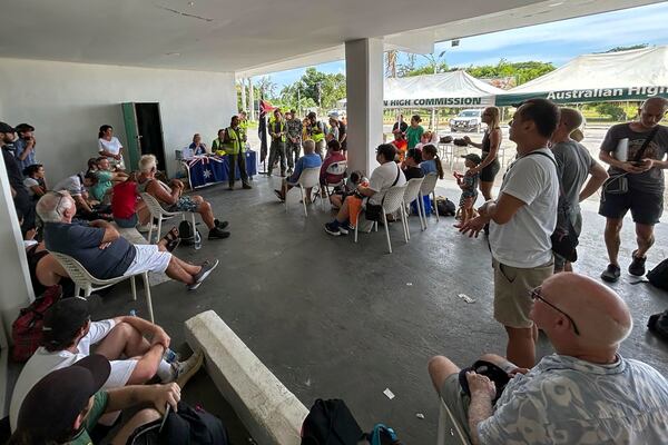 Australian citizen's are briefed on evacuation plans in Port Vila, Thursday, Dec. 19, 2024, following a magnitude 7.3 earthquake that struck off the coast of Vanuatu in the South Pacific Ocean, Tuesday, Dec. 17. (DFAT via AP)