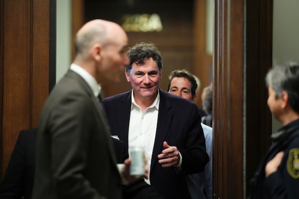 Finance Minister Dominic LeBlanc leaves during a break in a Liberal caucus meeting in Ottawa on Wednesday, Jan. 8, 2025. (Sean Kilpatrick/The Canadian Press via AP)