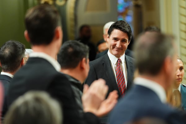 Prime Minister Justin Trudeau arrives at a cabinet swearing-in ceremony at Rideau Hall in Ottawa, on Friday, Dec.20, 2024.(Sean Kilpatrick /The Canadian Press via AP)