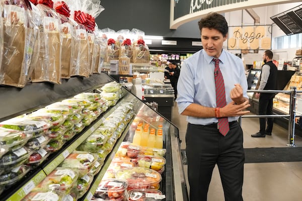 Prime Minister Justin Trudeau visits Vince's Market, a grocery store in Sharon, Ontario, on Thursday, Nov. 21, 2024. (Chris Young/The Canadian Press via AP)