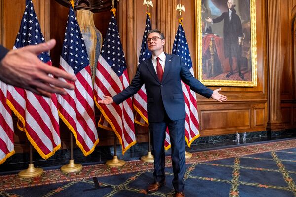 House Speaker Mike Johnson, R-La., greets families of members during a ceremonial swearing-in in the Rayburn Room at the Capitol in Washington, Friday, Jan. 3, 2025. (AP Photo/Jacquelyn Martin)