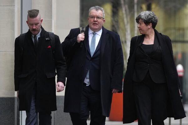 British lawmaker Tom Watson, center, arrives at the High Court, as Prince Harry's legal action against News Group Newspapers over allegations of unlawful information gathering begins, in London, Wednesday, Jan. 22, 2025. (AP Photo/Alastair Grant)