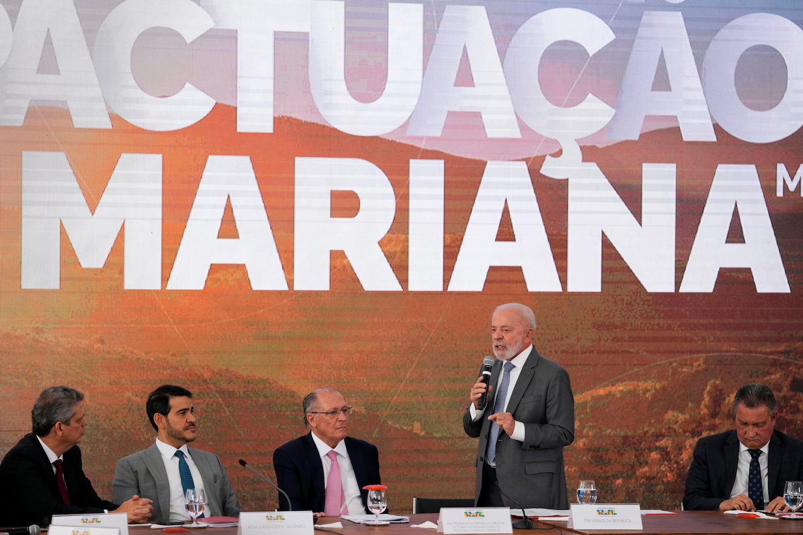 Brazil's President Luiz Inacio Lula da Silva speaks at a signing ceremony of a compensation agreement for damages caused by the 2015 collapse of the Mariana dam owned by the mining company Samarco, a joint venture of Vale and BHP, at the Planalto Presidential Palace, in Brasilia, Brazil, Friday, Oct. 25, 2024. (AP Photo/Eraldo Peres)