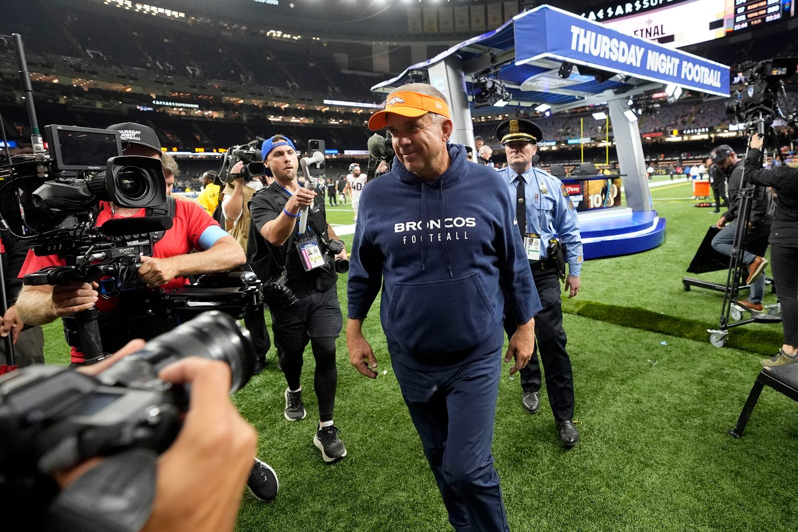 Denver Broncos head coach Sean Payton walks off the field after an NFL football game against the New Orleans Saints, Thursday, Oct. 17, 2024, in New Orleans. The Broncos won 33-10. (AP Photo/Gerald Herbert)