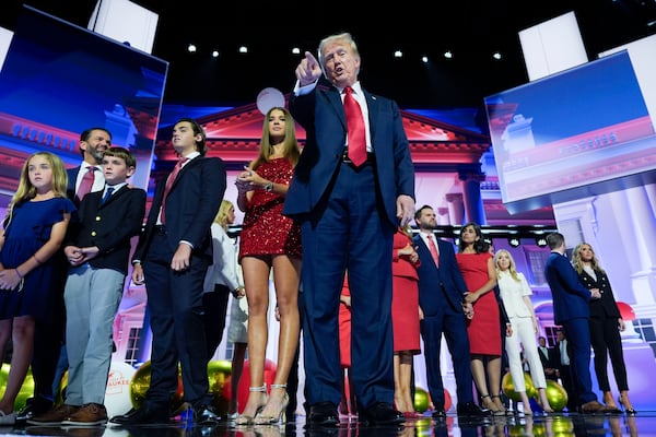 FILE - Republican presidential candidate former President Donald Trump stands on stage with former first lady Melania Trump, family members and Republican vice presidential candidate Sen. JD Vance, R-Ohio, and his wife, Usha Chilukuri Vance, during the 2024 Republican National Convention at the Fiserv Forum on July 18, 2024, in Milwaukee. (AP Photo/Carolyn Kaster, File)