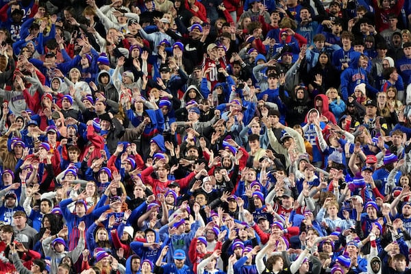 Kansas fans celebrate after a touchdown during the second half of an NCAA college football game against Colorado, Saturday, Nov. 23, 2024, in Kansas City, Mo. (AP Photo/Charlie Riedel)