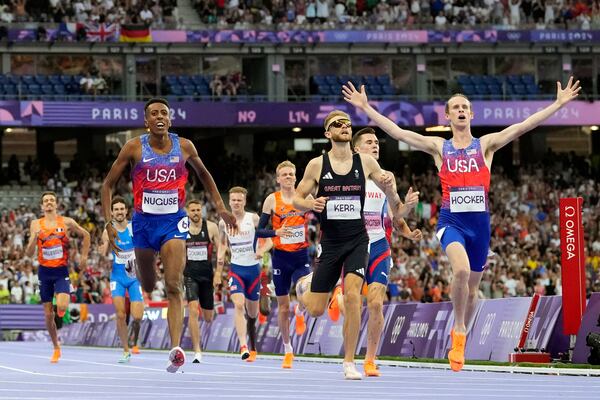 FILE - Cole Hocker, of the United States, celebrates after winning the men's 1500-meters final at the 2024 Summer Olympics, Tuesday, Aug. 6, 2024, in Saint-Denis, France. (AP Photo/Petr David Josek, File)