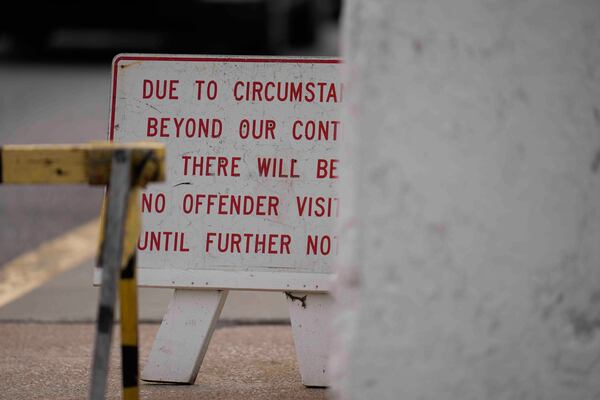 A sign is posted outside of Indiana State Prison where, barring last-minute court action or intervention by Gov. Eric Holcomb, Joseph Corcoran, 49, convicted in the 1997 killings of his brother and three other people, is scheduled to be put to death by lethal injection before sunrise Tuesday, Dec. 17, 2024, in Michigan City, Ind. (AP Photo/Erin Hooley)