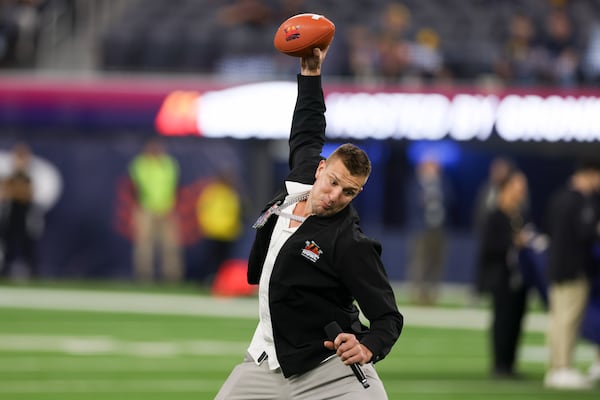 Former NFL tight end Rob Gronkowski spikes the ball before the LA Bowl NCAA college football game between California and UNLV Wednesday, Dec. 18, 2024, in Inglewood, Calif. (AP Photo/Ryan Sun)