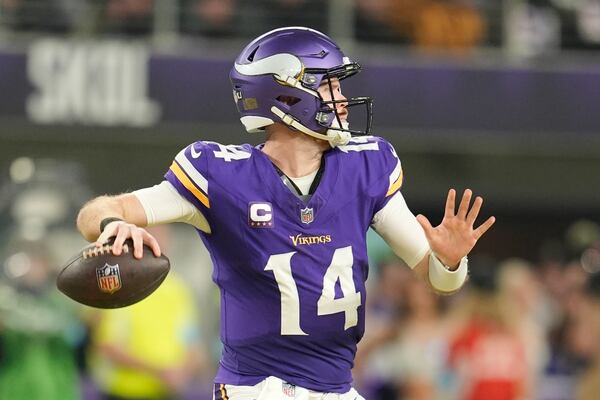 Minnesota Vikings' Sam Darnold throws during the second half of an NFL football game against the Green Bay Packers Sunday, Dec. 29, 2024, in Minneapolis. (AP Photo/Abbie Parr)