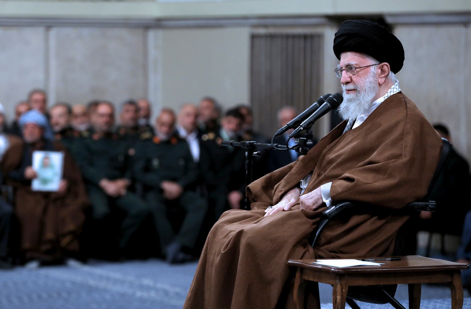 In this photo released by an official website of the office of the Iranian supreme leader, Supreme Leader Ayatollah Ali Khamenei sits in a meeting in Tehran, Iran, Sunday, Oct. 27, 2024. (Office of the Iranian Supreme Leader via AP)