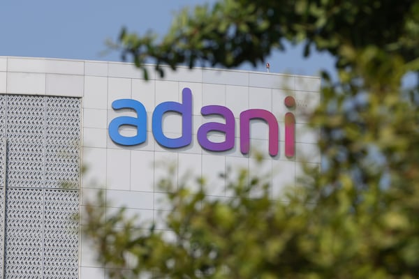 Adani's signage is seen on the facade of Adani's corporate house in Ahmedabad, India, Thursday, Nov. 21, 2024. (AP Photo/Ajit Solanki)