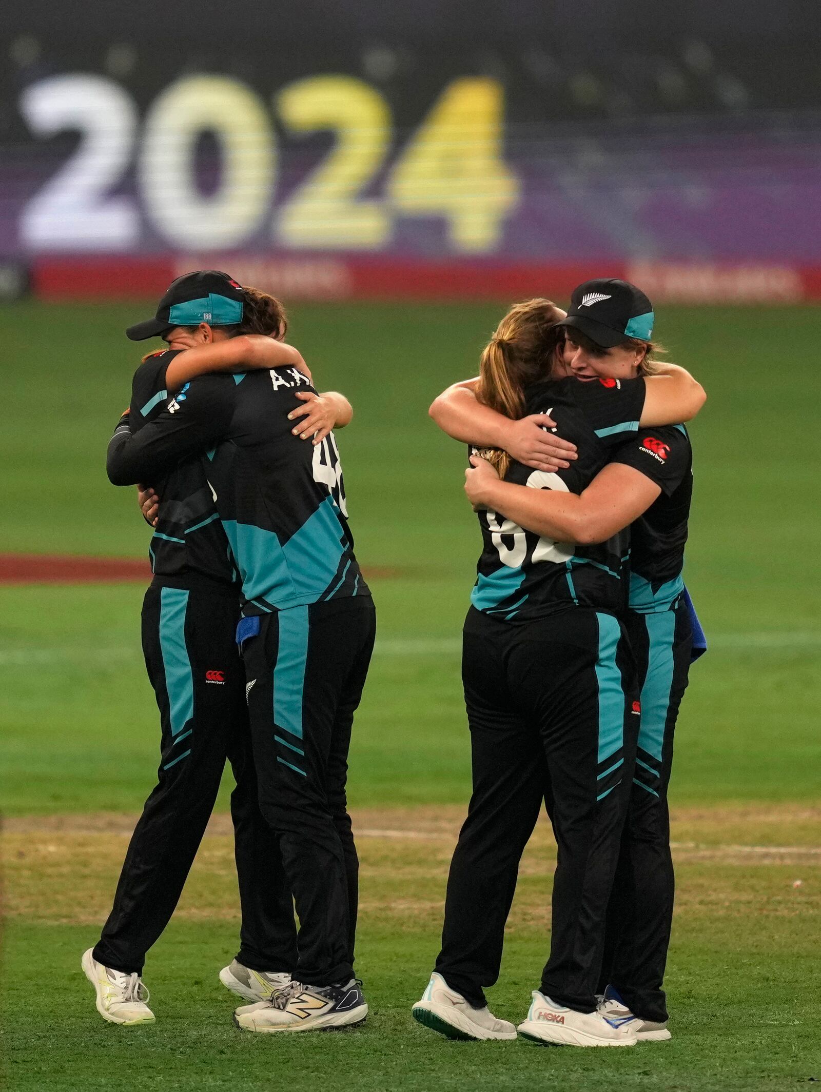 New Zealand's players celebrate after winning the ICC Women's T20 World Cup 2024 final match against South Africa at Dubai, United Arab Emirates, Sunday, Oct. 20, 2024. (AP Photo/Altaf Qadri)