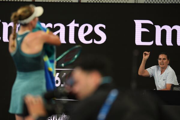 Conchita Martinez, right, coach for Mirra Andreeva of Russia gestures during her first round match against Marie Bouzkova of the Czech Republic at the Australian Open tennis championship in Melbourne, Australia, Sunday, Jan. 12, 2025. (AP Photo/Ng Han Guan)