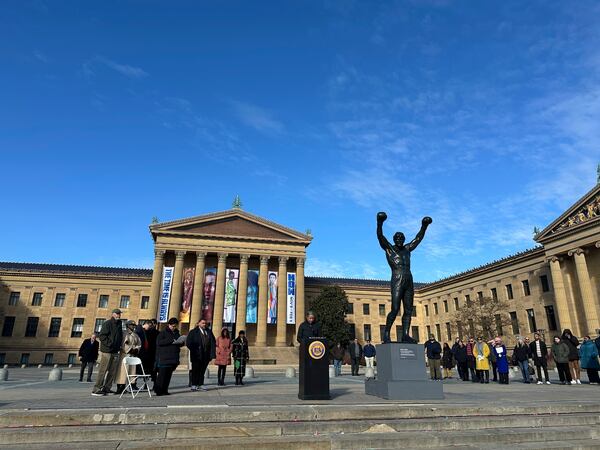 Visitors gather around the Rocky Statue and the “Rocky Steps” during RockyFest 2024 at the Philadelphia Museum of Art, Tuesday, Dec. 3, 2024, in Philadelphia. (AP Photo Tassanee Vejpongsa)