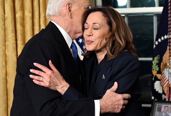 President Joe Biden hugs Vice President Kamala Harris after giving his farewell address from the Oval Office of the White House Wednesday, Jan. 15, 2025, in Washington. (Mandel Ngan/Pool via AP)