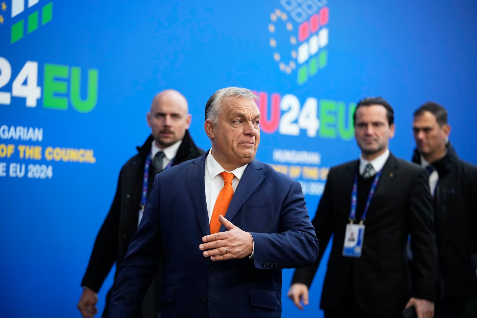 Hungary's Prime Minister Viktor Orban, second left, speaks with the media at arrivals for an EU Summit at the Puskas Arena in Budapest, Hungary, Friday, Nov. 8, 2024. (AP Photo/Petr David Josek)