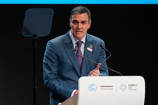 Spain President Pedro Sanchez speaks during a plenary session during a plenary session at the COP29 U.N. Climate Summit, Tuesday, Nov. 12, 2024, in Baku, Azerbaijan. (AP Photo/Rafiq Maqbool)