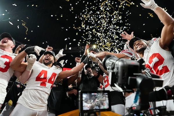 Ohio State celebrates after their win against Notre Dame in the College Football Playoff national championship game Monday, Jan. 20, 2025, in Atlanta. (AP Photo/Brynn Anderson)